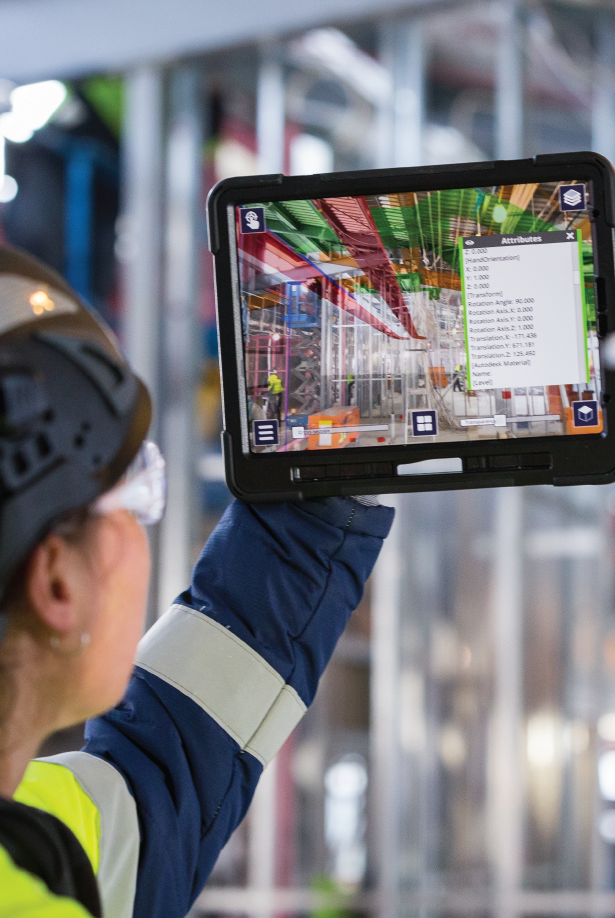 Woman using Connect AR on tablet on construction site